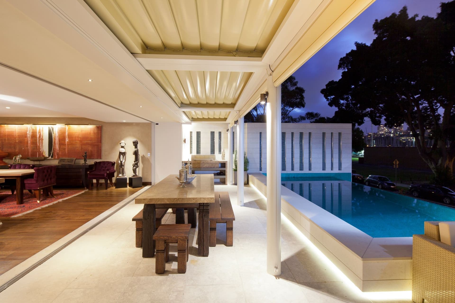Villa and pool at night